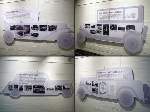 Collage von Ausstellungstafeln der Ausstellung "André Citroën", die Tafeln sind in der Form alter Automobile gestaltet